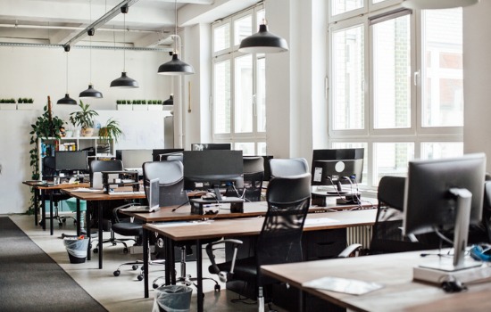 Desks set up in rows in Commercial Office Spaces for Sale in Peoria IL