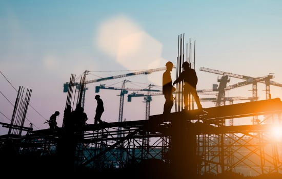 Construction workers beginning the initial work of property development in Peoria IL