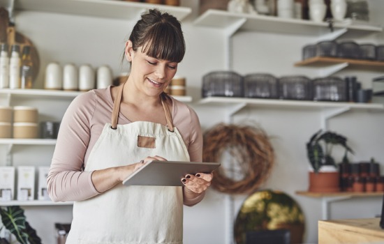 Woman running a small business in a commercial retail space for lease in Peoria IL